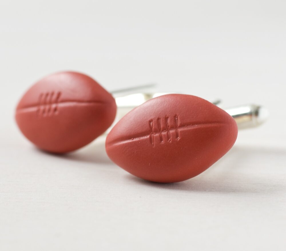 Boutons de manchette ballons de rugby